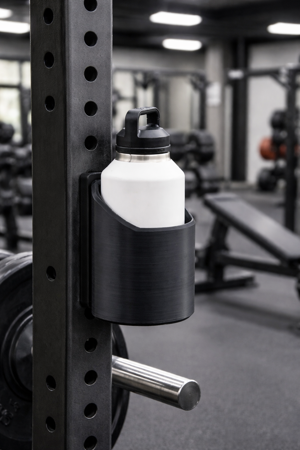 Magnetic gym water bottle holder on steel workout machine