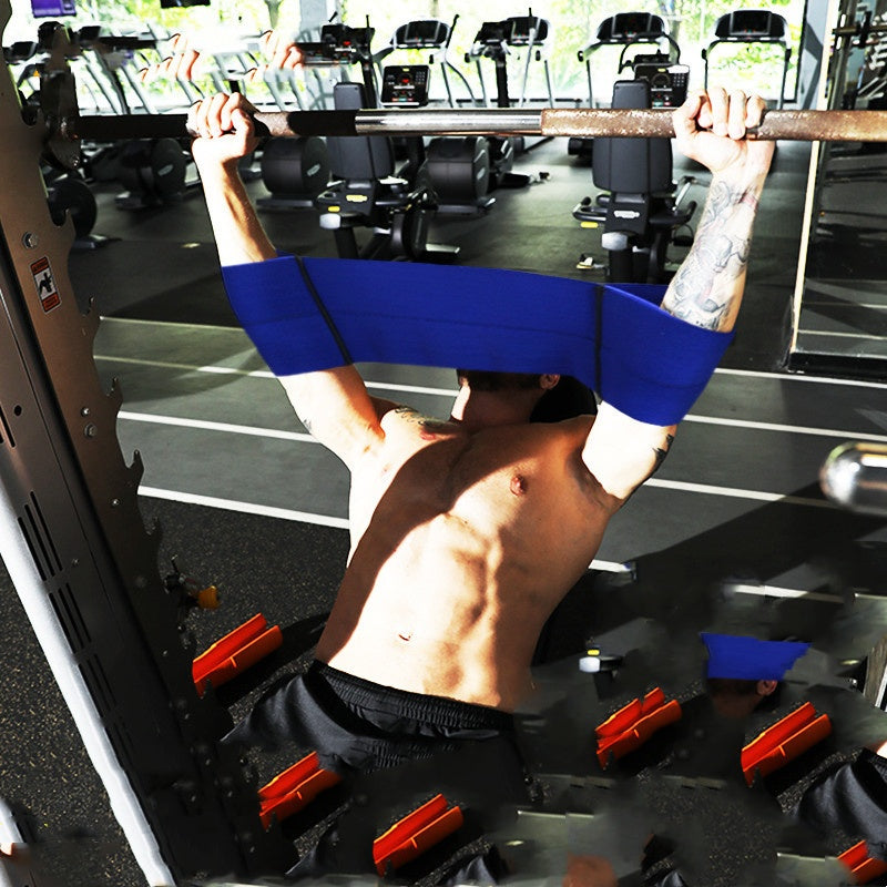 Bench press slingshot assistance band used during barbell bench press