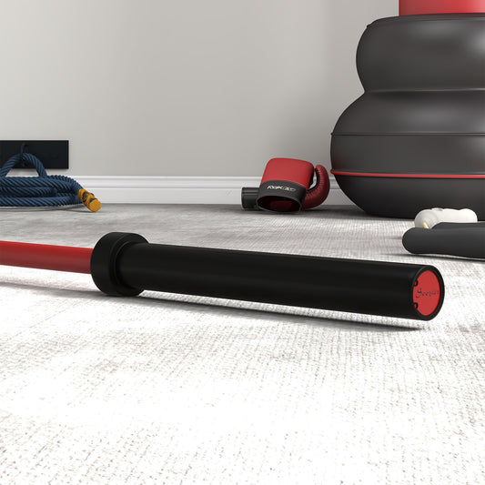 Olympic barbell with non-slip knurling grip and red finish detail